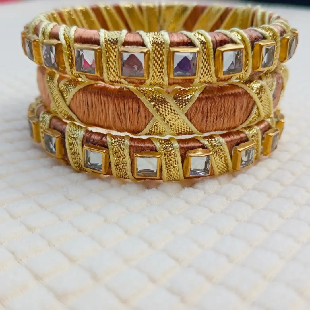 Golden Grace Bangles – Thread & Kundan Charm